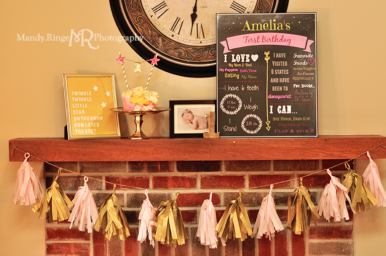 Baby girl's first birthday portraits // Smash cake session // Pink and gold // Birthday party fireplace mantel setup, baby photo, chalkboard infographic, tassle garland, smash cake, number one, Twinkle Twinkle print // by Mandy Ringe Photography