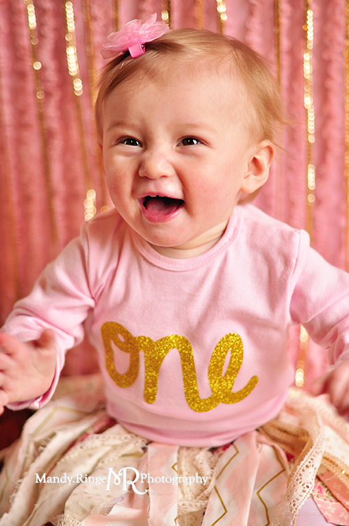 Baby girl's first birthday portraits // Pink and gold // Pink ruffle background, gold sequins, fabric strip skirt, glitter // by Mandy Ringe Photography