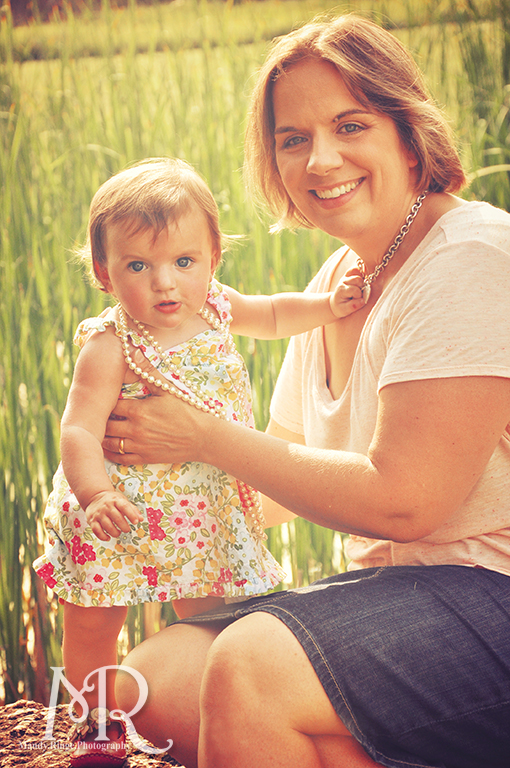 Baby girl wearing pearls standing with her mother // Leroy Oaks // by Mandy Ringe Photography
