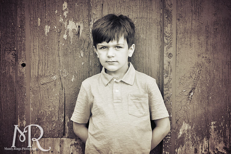 Boy in front of a barn // Leroy Oaks // by Mandy Ringe Photography