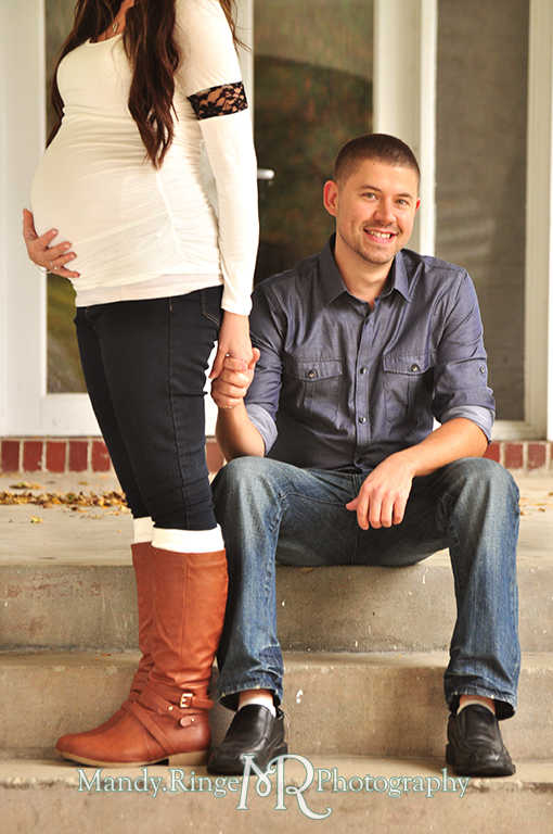Man and pregnant woman posing on stairs with the focus being on the man holding her hand as she holds her belly // Maternity portraits // Hurley Gardens - Wheaton, IL // by Mandy Ringe Photography
