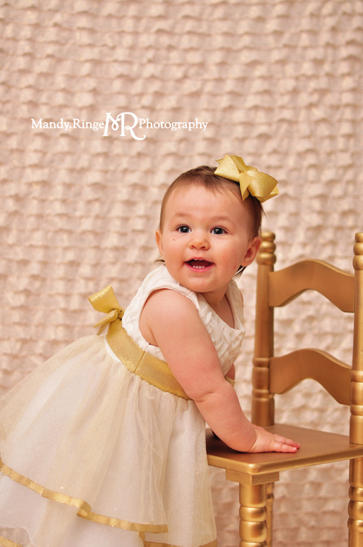 Baby girl's first birthday portraits // Blush and gold, ruffle fabric, white fur, gold chair // St Charles, IL // by Mandy Ringe Photography