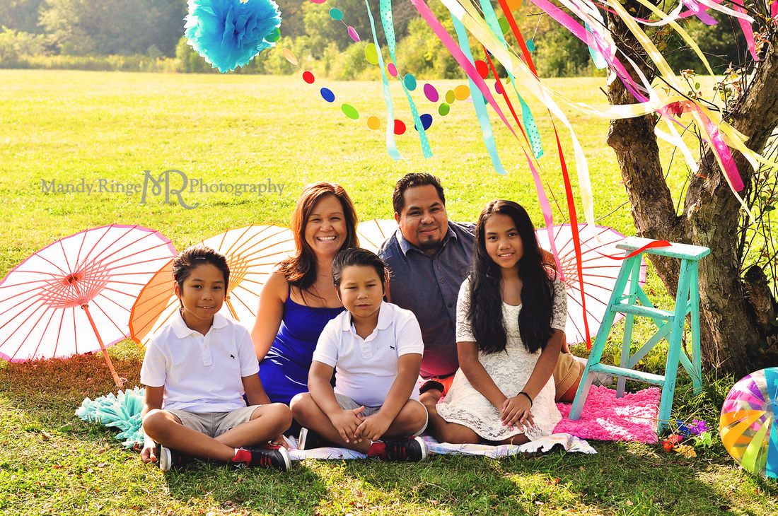 Summer Celebration styled mini session event // colorful, rainbow, paper parasols, rag rugs, beach ball, tissue poms, ribbons, tree, pinwheels // Leroy Oakes Forest Preserve - St. Charles, IL // by Mandy Ringe Photography