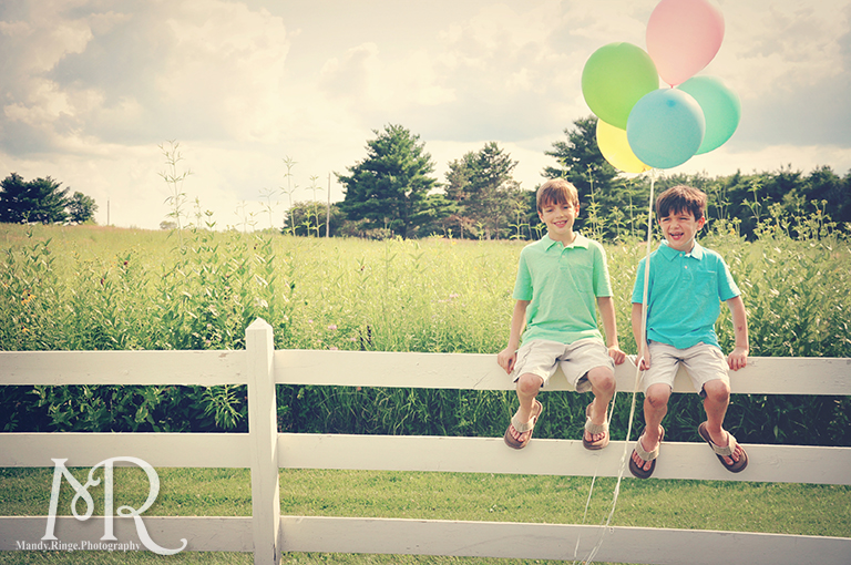 Boys sitting on a white fence with balloons // Leroy Oaks // by Mandy Ringe Photography