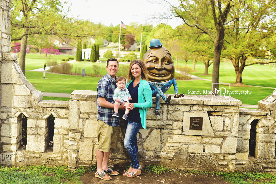 Spring family portraits // family of three, Humpty Dumpty statue, stone wall, teal and navy // Mount St. Mary Park - St. Charles, IL // by Mandy Ringe Photography