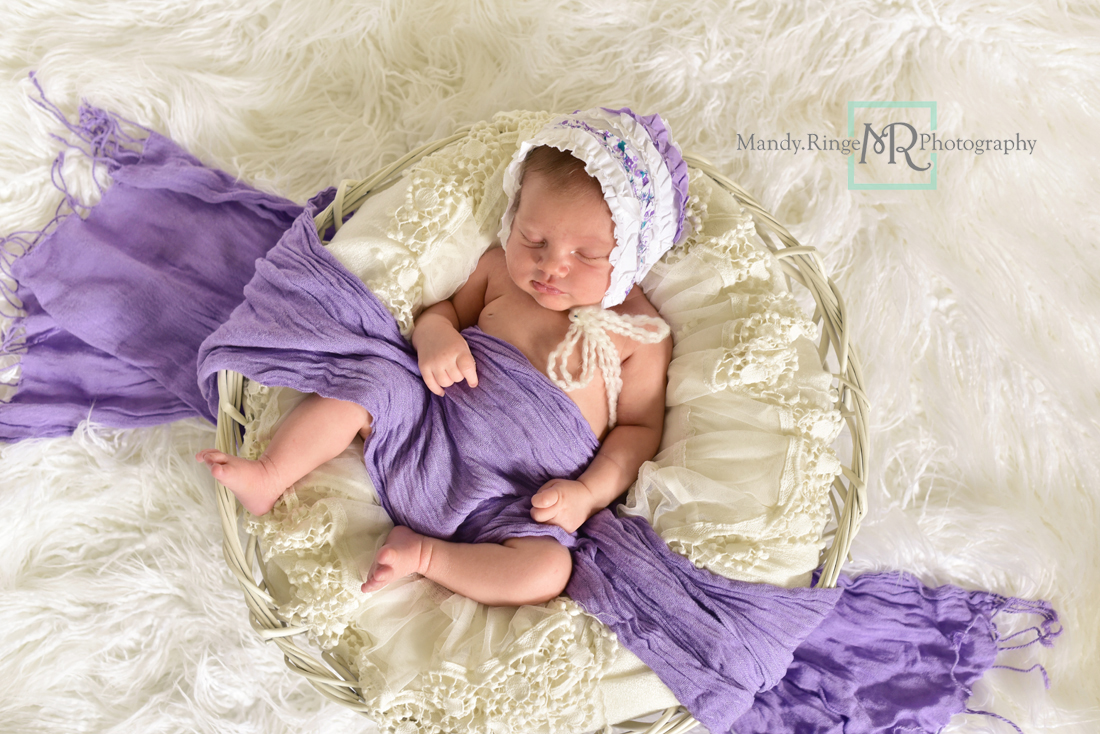 Newborn girl portraits // White woven bowl prop, vintage lace shawl layer, ivory, white, purple scarf, bonnett // Client's home - St Charles, IL // Mandy Ringe Photography