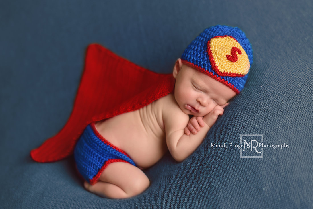 Newborn boy portraits // Crochet Superman outfit, bum up pose, blue blanket // St. Charles, IL studio // by Mandy Ringe Photography