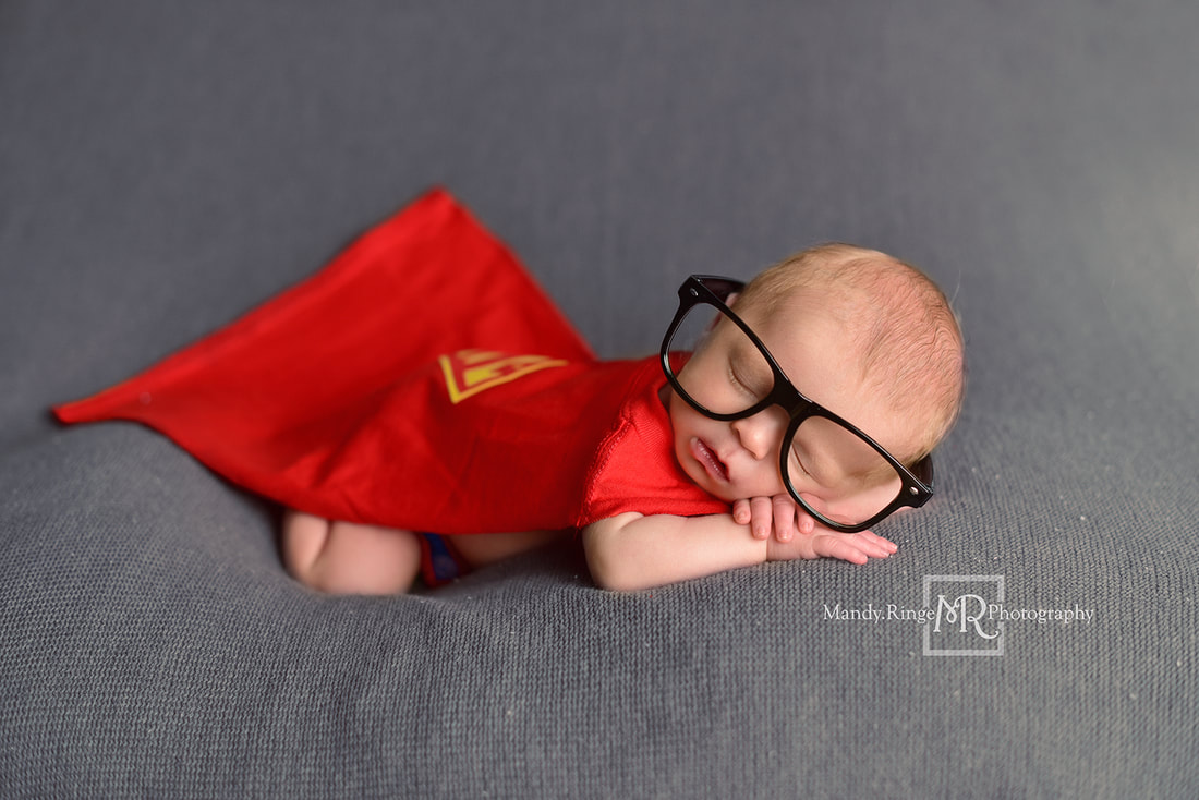 Newborn boy portraits // Superman outfit, cape, Clark Kent glasses, bum up pose, gray blanket // St. Charles, IL studio // by Mandy Ringe Photography