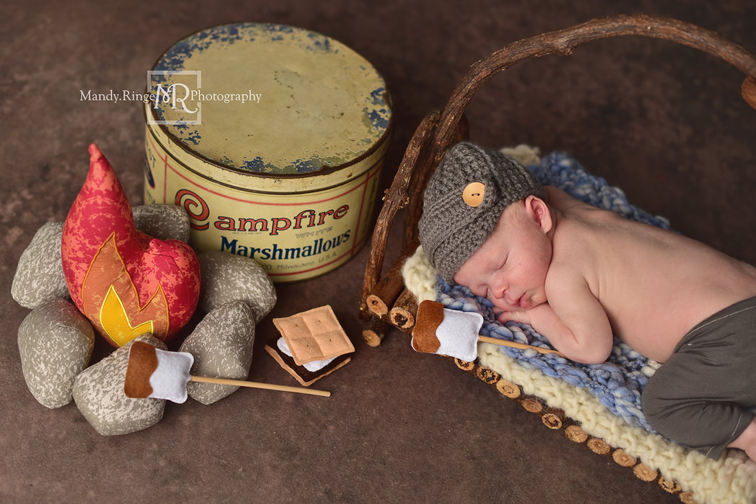 Newborn boy portraits // Twig bed, fake camp fire, campfire marshmallows tin, Smores props, Dirt Floordrop, Intuitions Backgrounds // St. Charles, IL studio // by Mandy Ringe Photography