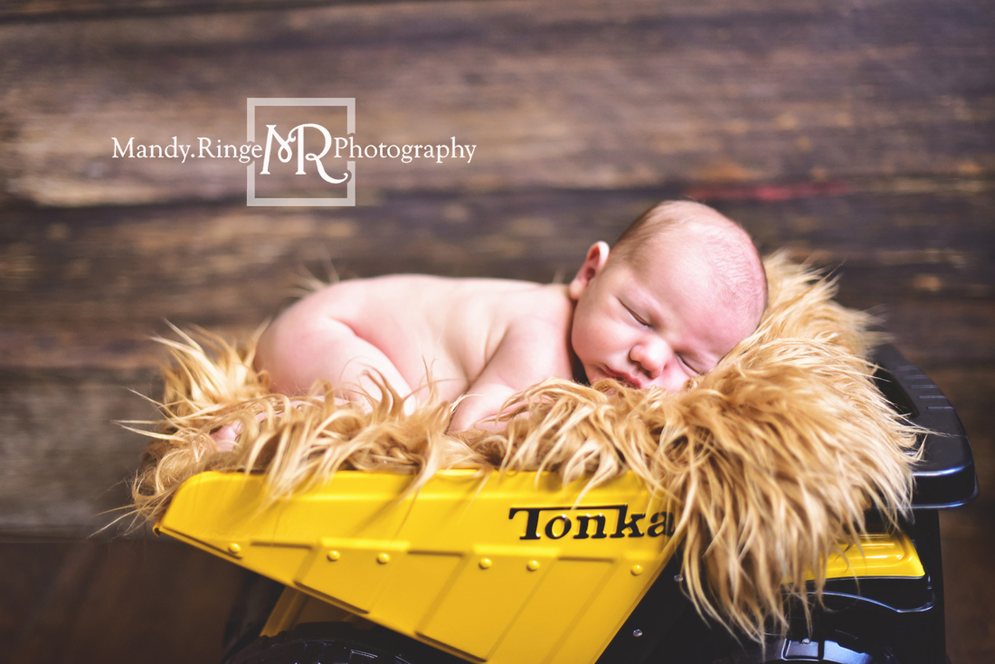 Newborn boy portraits // nude, caramel brown fur, Tonka dump truck // Client's home - travelling studio - Geneva, IL // Mandy Ringe Photography
