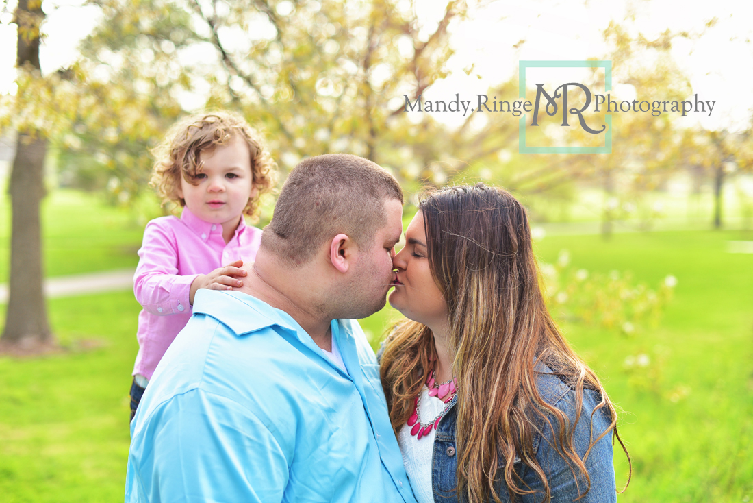 Spring family portraits // crab apple tree, pink and blue, outdoors, family of three, white flowers // Mount St. Mary Park - St Charles, IL // by Mandy Ringe Photography