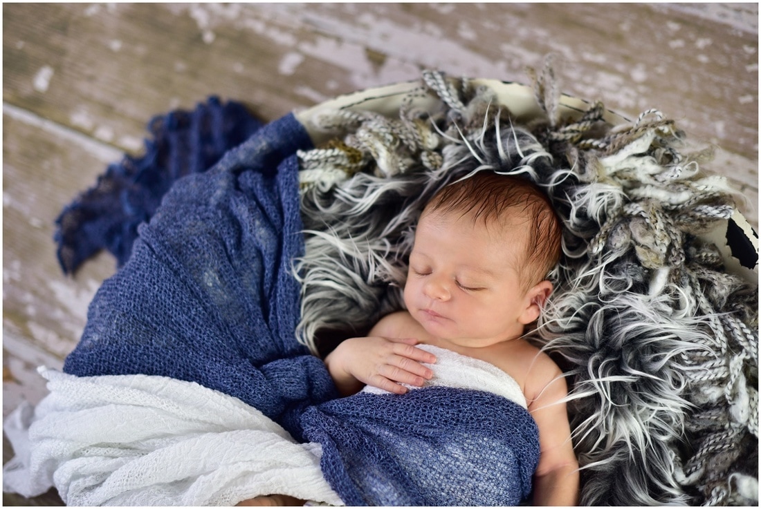 Newborn boy portraits // blue and white wrap, gray fur, white bowl  // St Charles, IL // by Mandy Ringe Photography