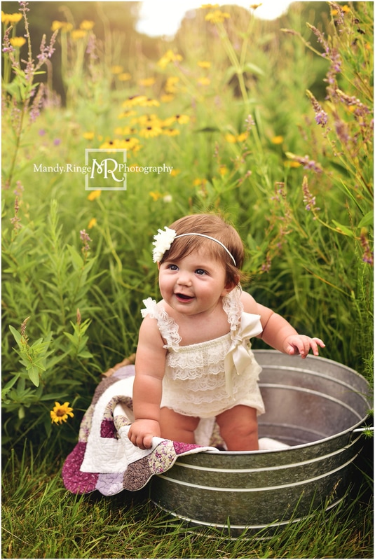 9 month old girl portraits // outdoors, wildflower field, galvanized tub, quilt layer, ivory ruffle romper // Wheeler Park - Geneva, IL // by Mandy Ringe Photography