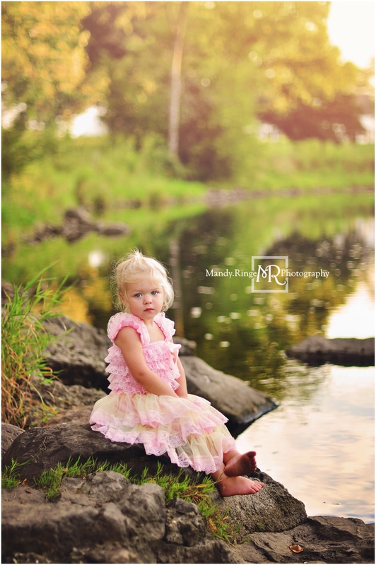 2 year old girl // fancy dress, pink and yellow ruffle, creek, goldenhour, summer, rocks // Leroy Oakes Forest Preserve - St. Charles, IL // by Mandy Ringe Photography