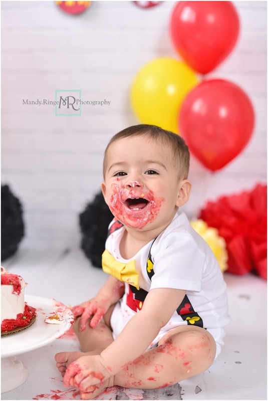 One year old boy portraits // first birthday, cake smash, mickey mouse, red, black, yellow, white, disney // St. Charles, IL // by Mandy Ringe Photography