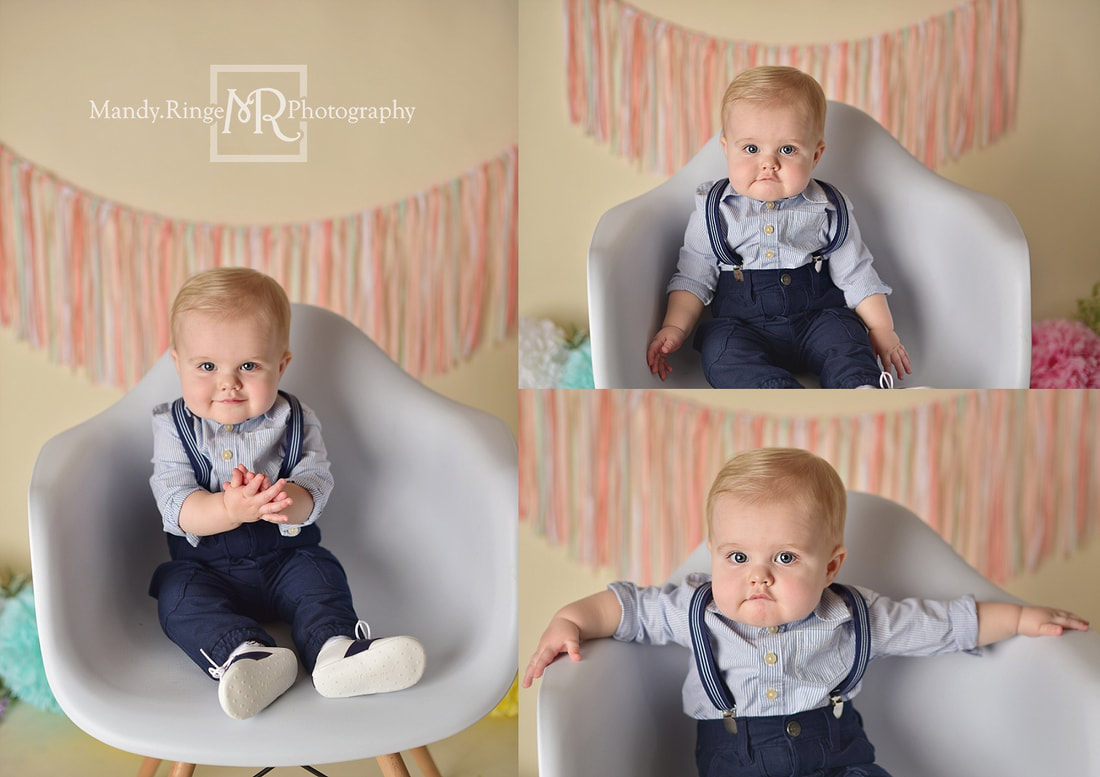 Boy and girl twins first birthday portraits // pastel, rainbow, colorful, spring, flowers, puffs, poofs, ribbon garland, white chair // by Mandy Ringe Photography // St. Charles, IL Photographer