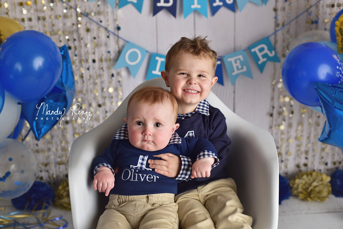First birthday milestone portraits // blue and gold balloons, sparkle, sequins // Mandy Ringe Photography // Sycamore, IL Photographer