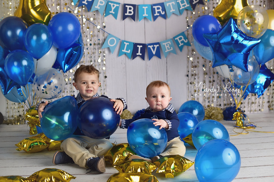 First birthday milestone portraits // blue and gold balloons, sparkle, sequins // Mandy Ringe Photography // Sycamore, IL Photographer