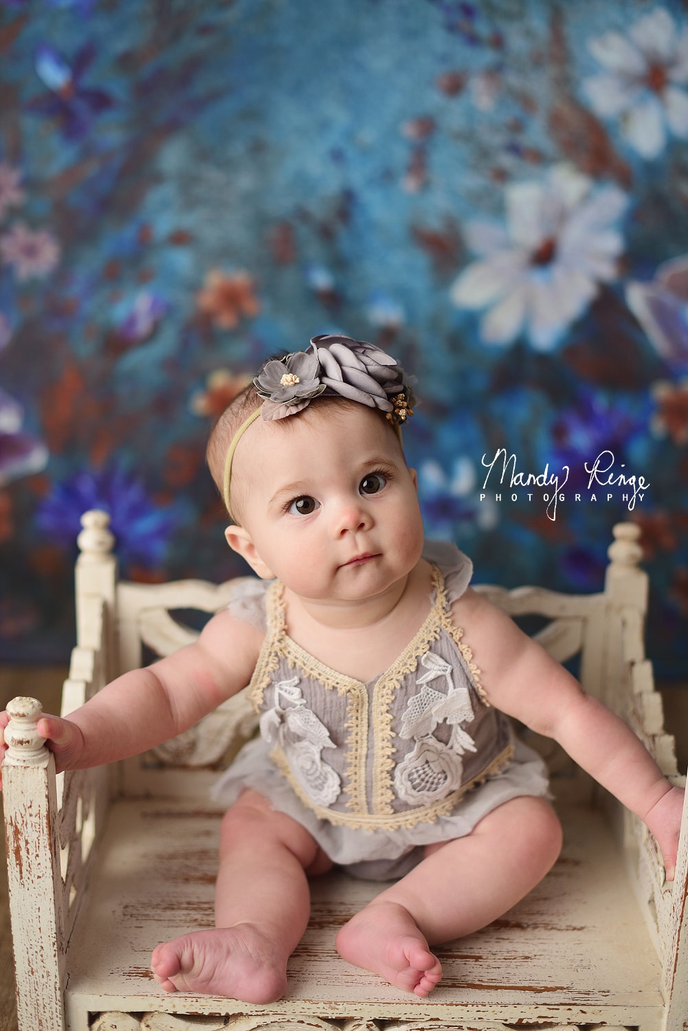 6 month milestone session // baby girl, blue floral backdrop, Cora & Violet Anwen outfit // Sycamore, IL studio photographer // Mandy Ringe Photography