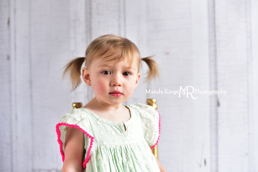 Toddler girl's second birthday portraits // Mint and hot pink, ivory rag rug, two years old // client home - traveling studio // by Mandy Ringe Photography
