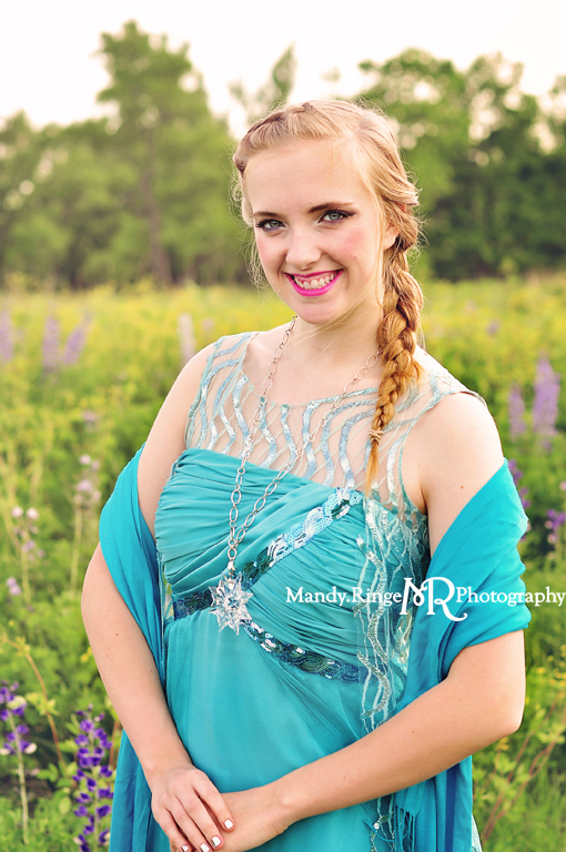 Elsa impersonator, cosplay, dressup, costume // Standing in a wildflower field. Magical snow overlays // by Mandy Ringe Photography