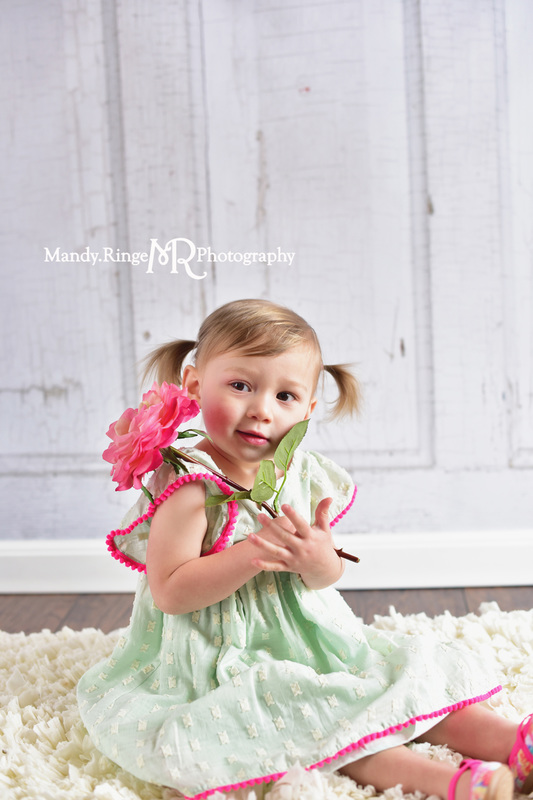 Toddler girl's second birthday portraits // Mint and hot pink, ivory rag rug, pink rose, two years old // client home - traveling studio // by Mandy Ringe Photography