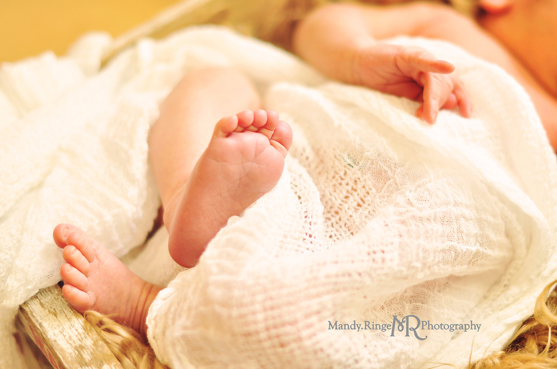 Newborn portraits - first newborn shoot // Loose ivory wrap, caramel fur stuffer, vintage crate // by Mandy Ringe Photography