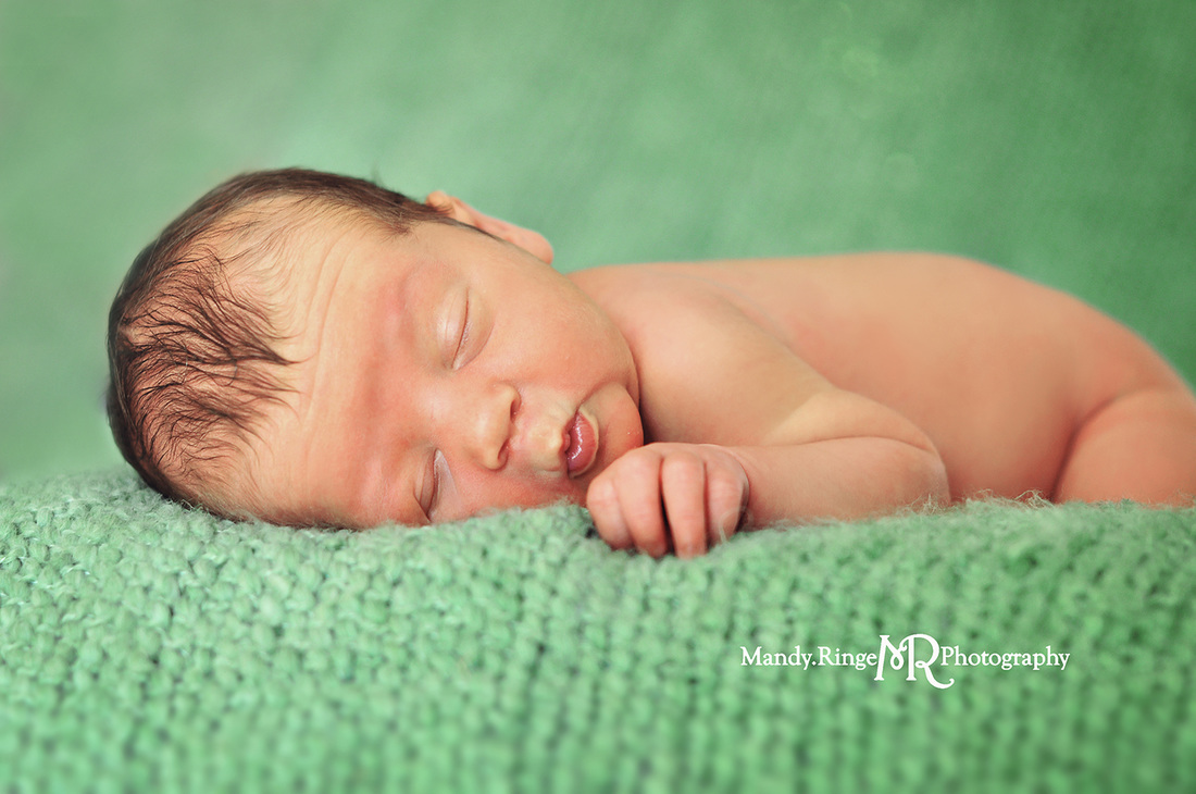 Newborn portraits - first newborn shoot // Light green knitted backdrop // by Mandy Ringe Photography
