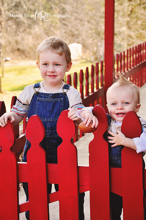 Cousins photo shoot // Boys, red fence, overalls // Camden, OH // by Mandy Ringe Photography