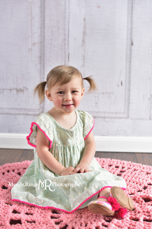 Toddler girl's second birthday portraits // Mint and hot pink, pink crochet afghan, two years old // client home - traveling studio // by Mandy Ringe Photography