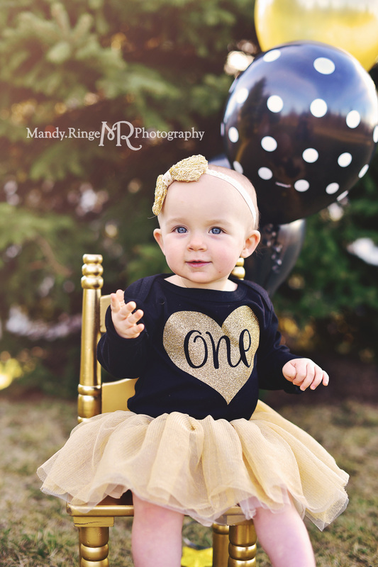 First birthday portraits // family photos, outdoors, black and gold, chair, balloons // by Mandy Ringe Photography