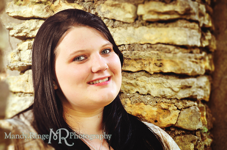 Teen girl standing by a stone wall // Senior Photos // Fabyan Forest Preserve - Batavia, IL // by Mandy Ringe Photography
