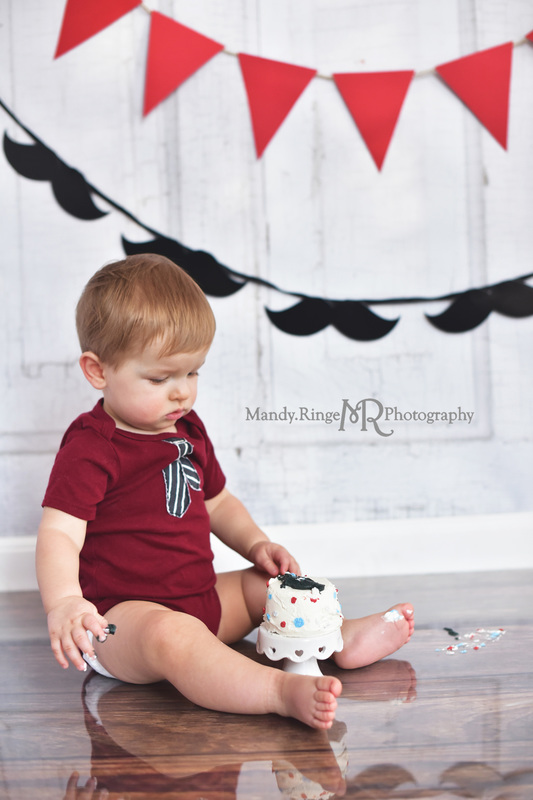 Boy's first birthday smash cake session // Little Gentleman, gray, blue, shabby gray stool, pennant banner, mustaches // Traveling studio session at client's home - South Elgin, IL // by Mandy Ringe Photography