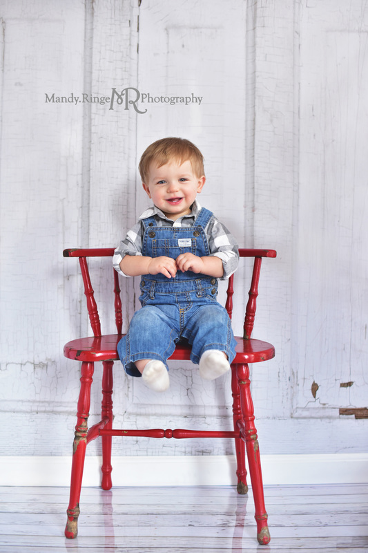 Boy's first birthday portraits // Red, gray, blue, overalls, shabby red chair, vintage inspired // Traveling studio session at client's home - South Elgin, IL // by Mandy Ringe Photography