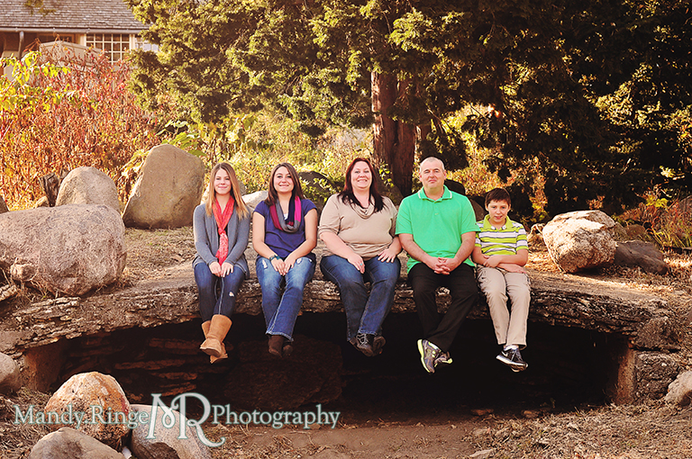 Autumn family portraits - sitting on a stone overhang // Fabyan Forest Preserve - Batavia, IL // by Mandy Ringe Photography