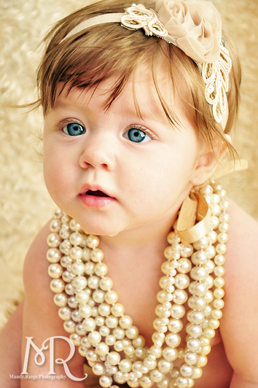 6 month old portrait with pearls and ivory flower headband // by Mandy Ringe Photography