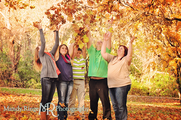 Autumn family portraits - Throwing leaves in the air // Fabyan Forest Preserve - Batavia, IL // by Mandy Ringe Photography
