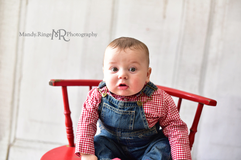 5 month old boy photo shoot // Denim overalls, red and white checkered shirt, vintage backdrop, red chair // Client's home - Winfield, IL // by Mandy Ringe Photography