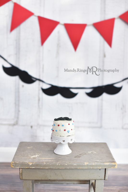 Boy's first birthday smash cake session // Smash cake, gray, blue, shabby gray stool, pennant banner, mustaches // Traveling studio session at client's home - South Elgin, IL // by Mandy Ringe Photography