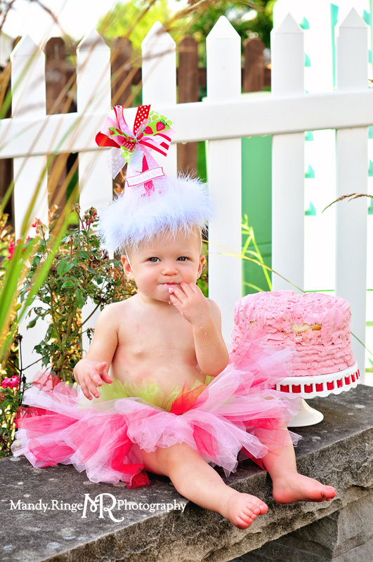 Girl first birthday portraits // Strawberry themed, cake smash, outdoors, tutu // by Mandy Ringe Photography