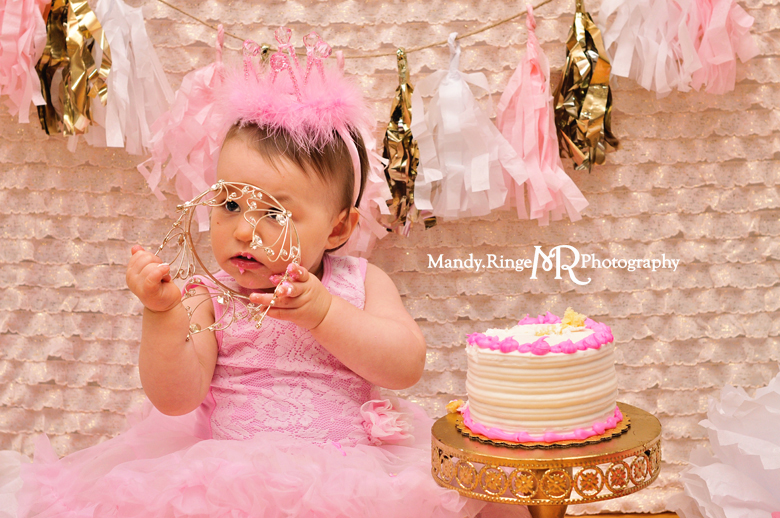 Baby girl's first birthday smash cake portraits // Blush, pink, white, and gold, ruffle fabric, tissue paper poms, tissue paper garland // St Charles, IL // by Mandy Ringe Photography