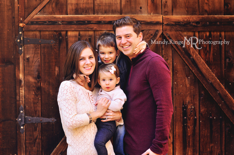 Fall family portraits // Dark brown barn door, leaves // River Trail Nature Center - Northbrook, IL // by Mandy Ringe Photography