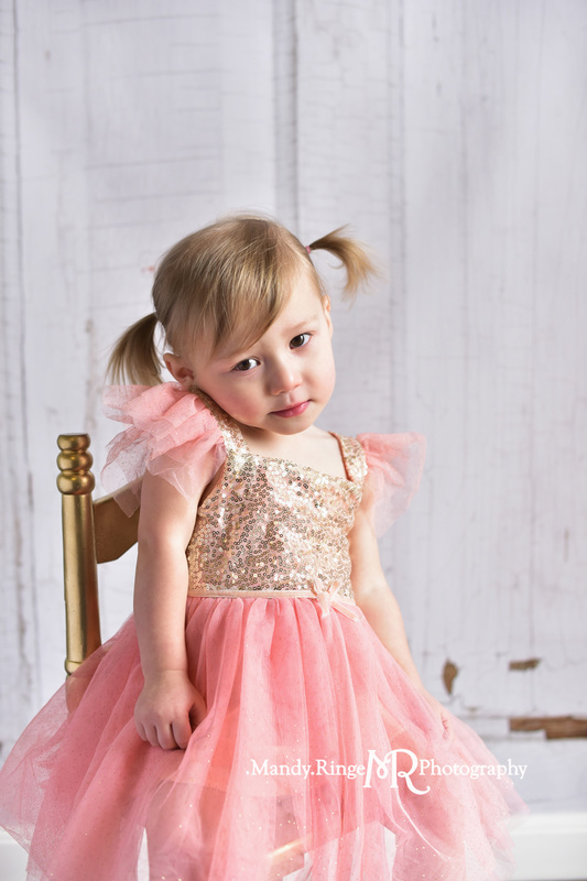 Toddler girl's second birthday portraits // pink and gold angel sleeve dress, gold sequins, two years old // client home - traveling studio // by Mandy Ringe Photography