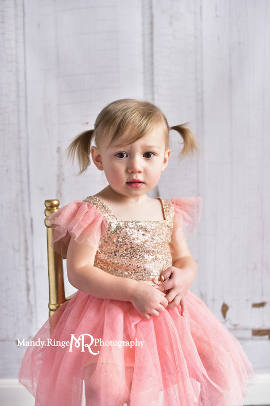 Toddler girl's second birthday portraits // pink and gold angel sleeve dress, gold sequins, two years old // client home - traveling studio // by Mandy Ringe Photography