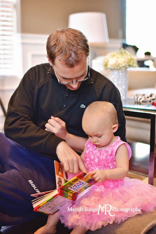Lifestyle first birthday portraits // reading a book with dad // by Mandy Ringe Photography
