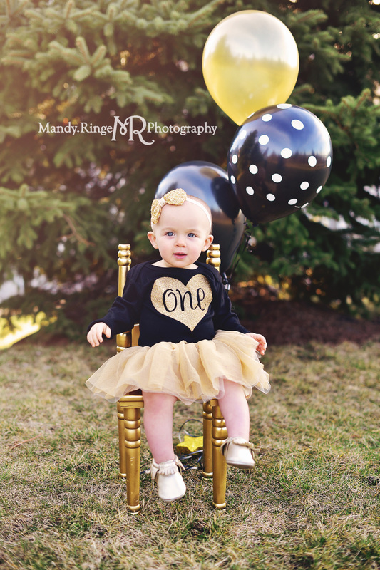 First birthday portraits // family photos, outdoors, black and gold, chair, balloons // by Mandy Ringe Photography