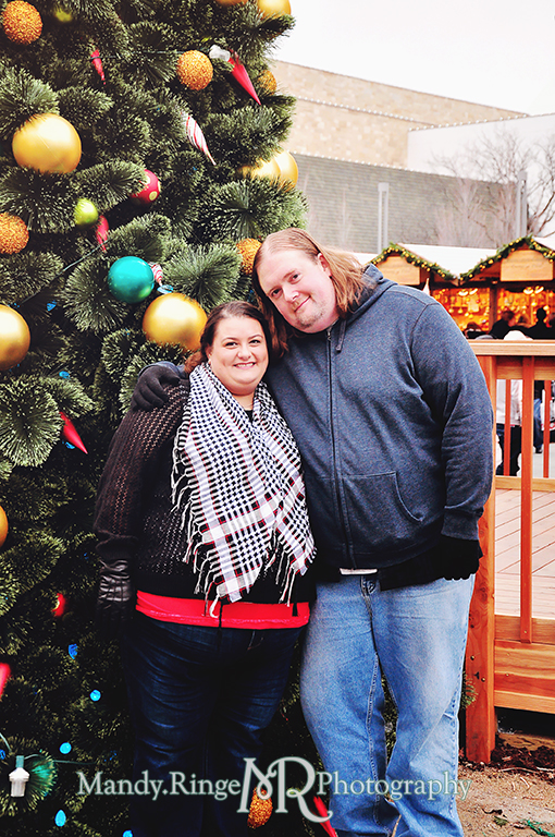 Couple standing in front of the Christmas tree // Christkindlmarket // Oakbrook, IL // by Mandy Ringe Photography
