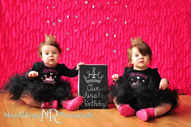 Twin girl's first birthday portraits // Pink and black, tutus, gold lace crowns, pink cowboy boots, pink ruffle backdrop, rhinestones, chalkboard sign // by Mandy Ringe Photography