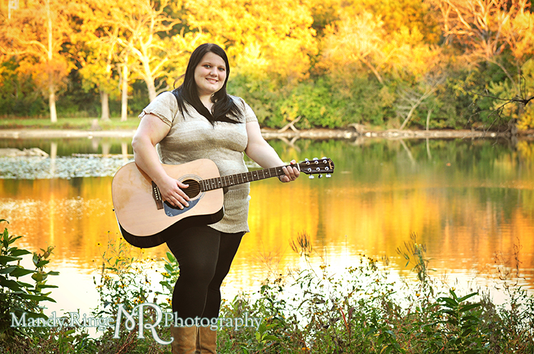 Teen girl holding a guitar, standing by a river // Senior Photos // Fabyan Forest Preserve - Batavia, IL // by Mandy Ringe Photography