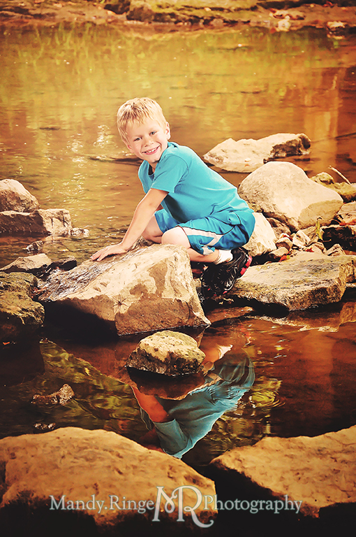 Young boy standing in a creek bed with reflection in the water  // Child Photography // Eaton, OH // by Mandy Ringe Photography